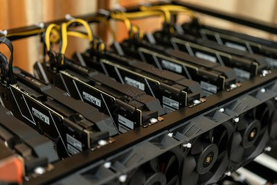 An aerial view of a German mining farm utilizing wind energy, showcasing sustainable crypto operations